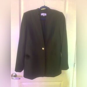 Calvin Klein black blazer with gold button and pockets. Like new! Size L $25 OBO